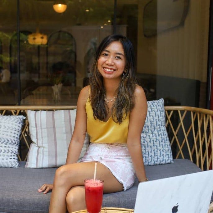 Trisha Lim outside in a chair