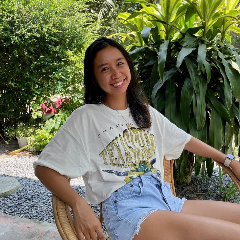 Trisha Lim outside in a chair